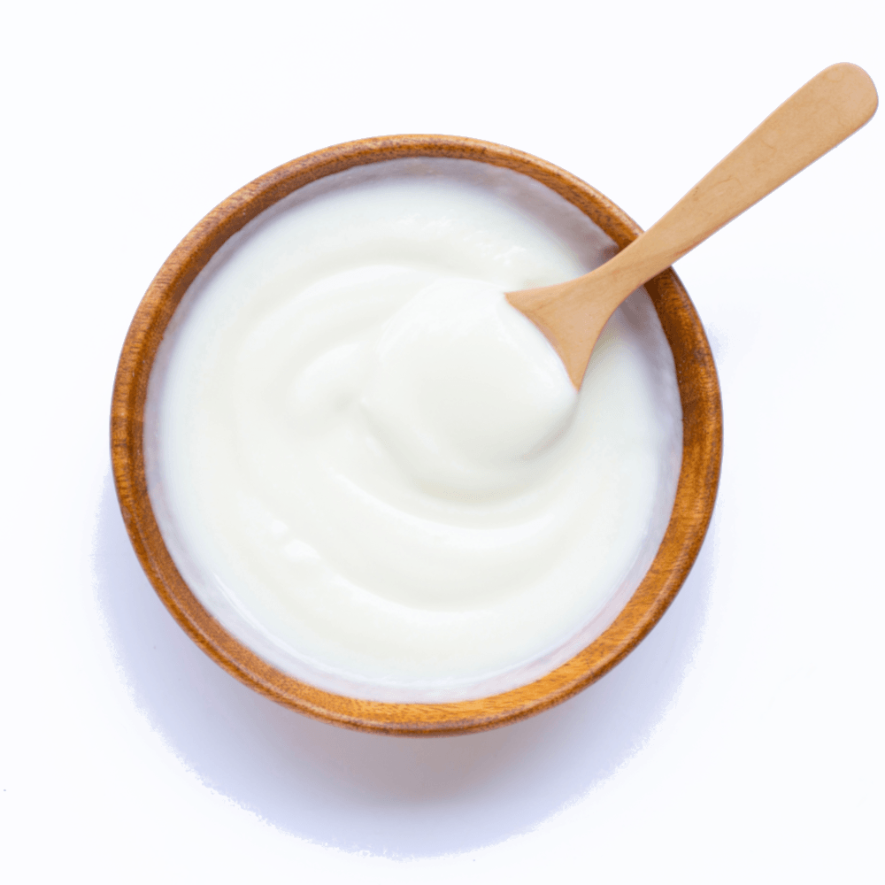 KAQUN výživový doplnok inside-out zloženie biely jogurt v drevenej miske s lyžičkou